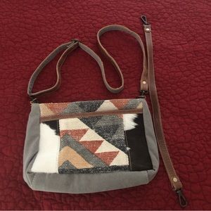 Myra Bag with gray, rust and cream pattern detail. Zippered pockets. Like new.